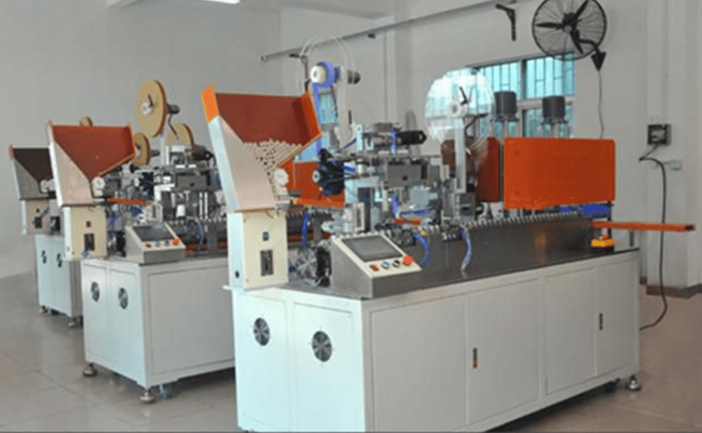 Cylindrical cell production machine